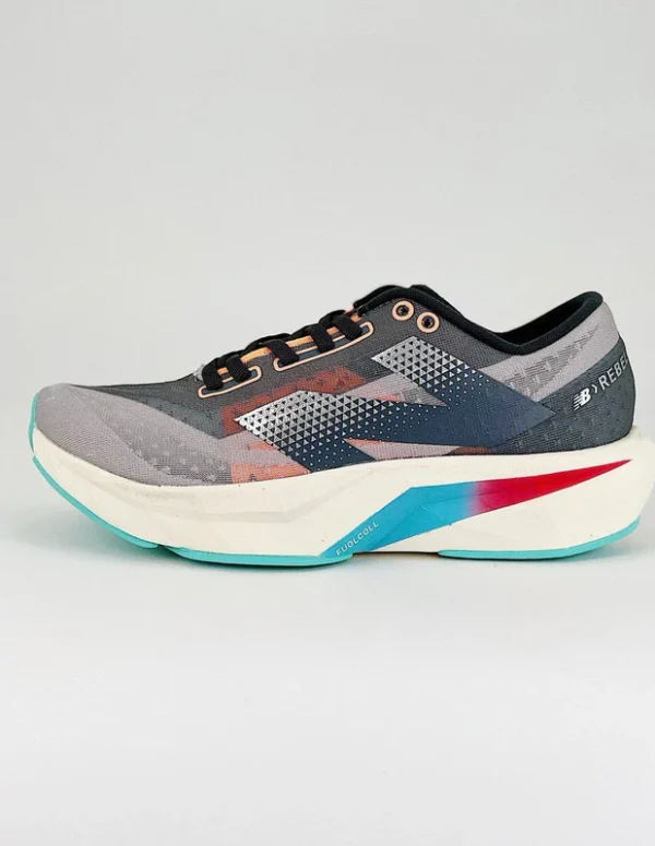New Balance SC Elite V4 Sneakers In Grey, Rose Blue And Red